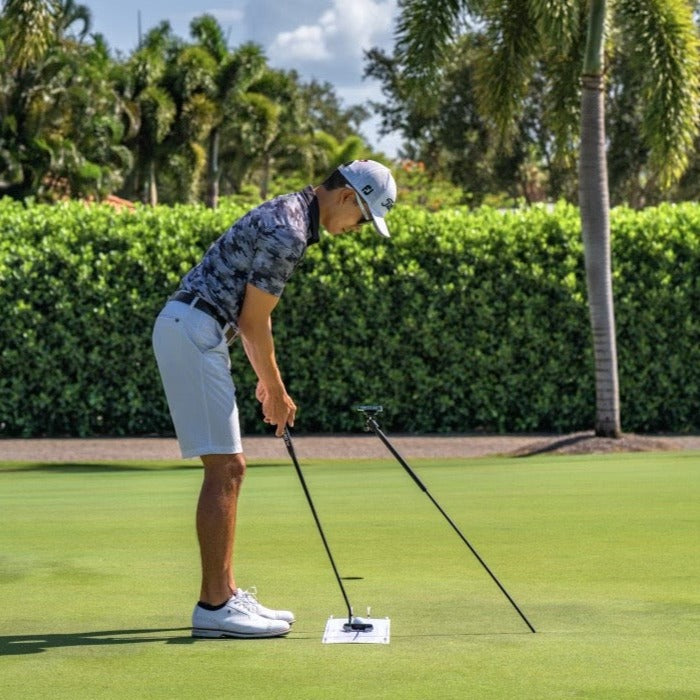 GPOD magsafe golf phone caddy inserted into the ground to film putting swing. A tripod cannot film this angle.